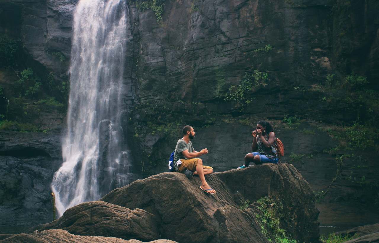 Couple by waterfall