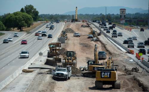 Cars traveling an interstate highway under construction