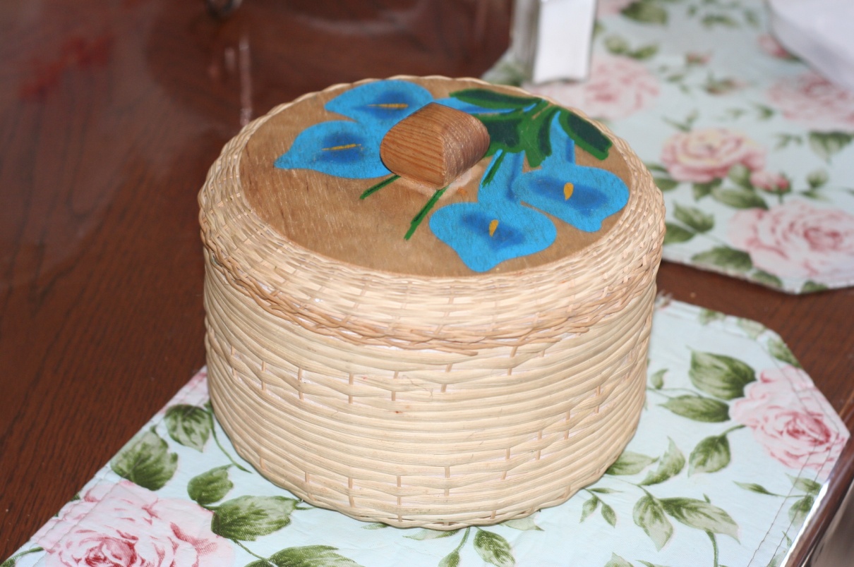 a decorated tortilla basket sitting on a table