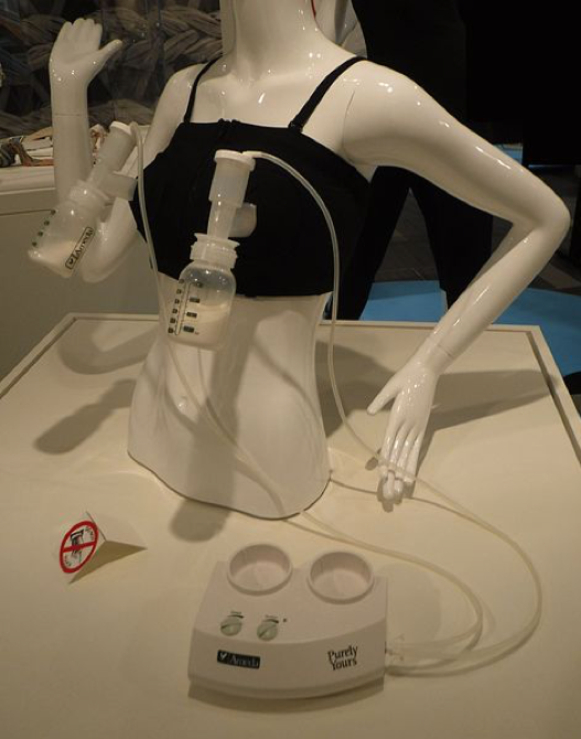 torso of a mannequin wearing a double breast pump