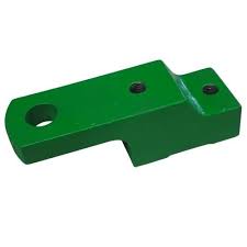 Green metal attachment piece with a hole and a raised section, typically used in machinery or equipment.