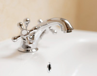 Image of bathroom faucet by the EPA is in the public domain