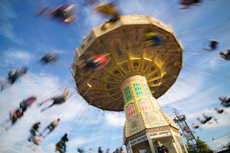 An amusement park ride that is like a carousel with swings, whirling people through the air.